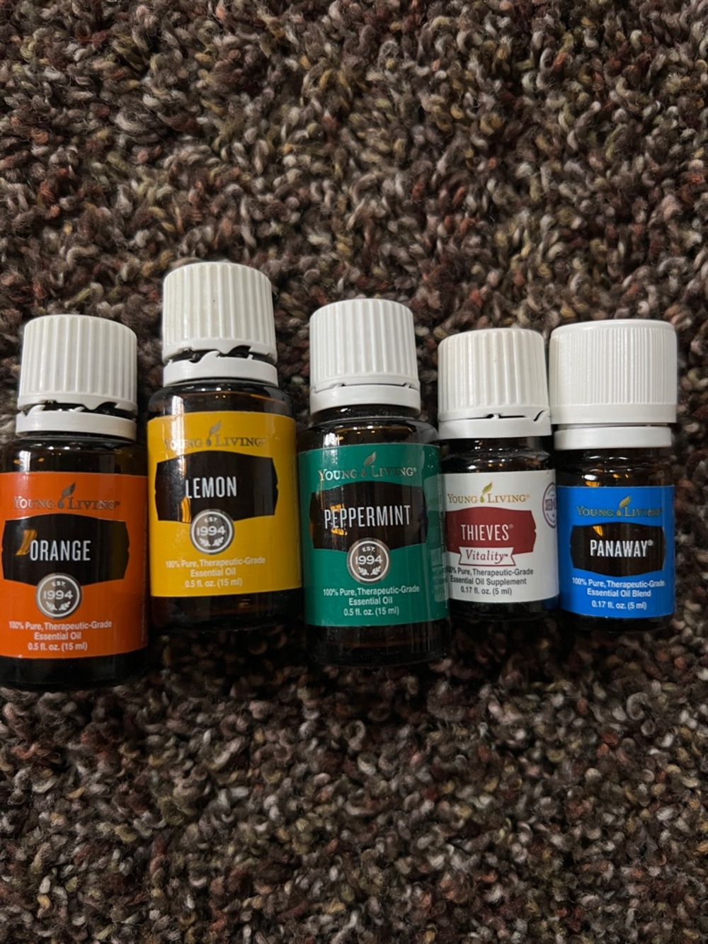 YL Essential Oils opened orange, Lemon. Sealed peppermint thieves panaway